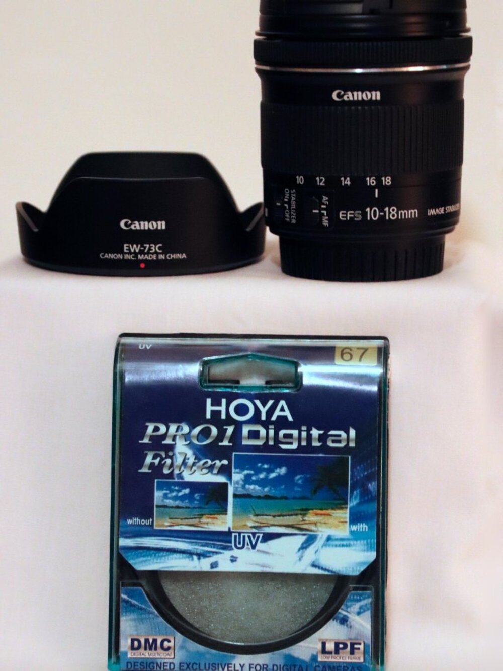 MINT Canon EF-S 10-18mm f/4.5-5.6 IS STM Lens with Caps, Hood, and UV Filter